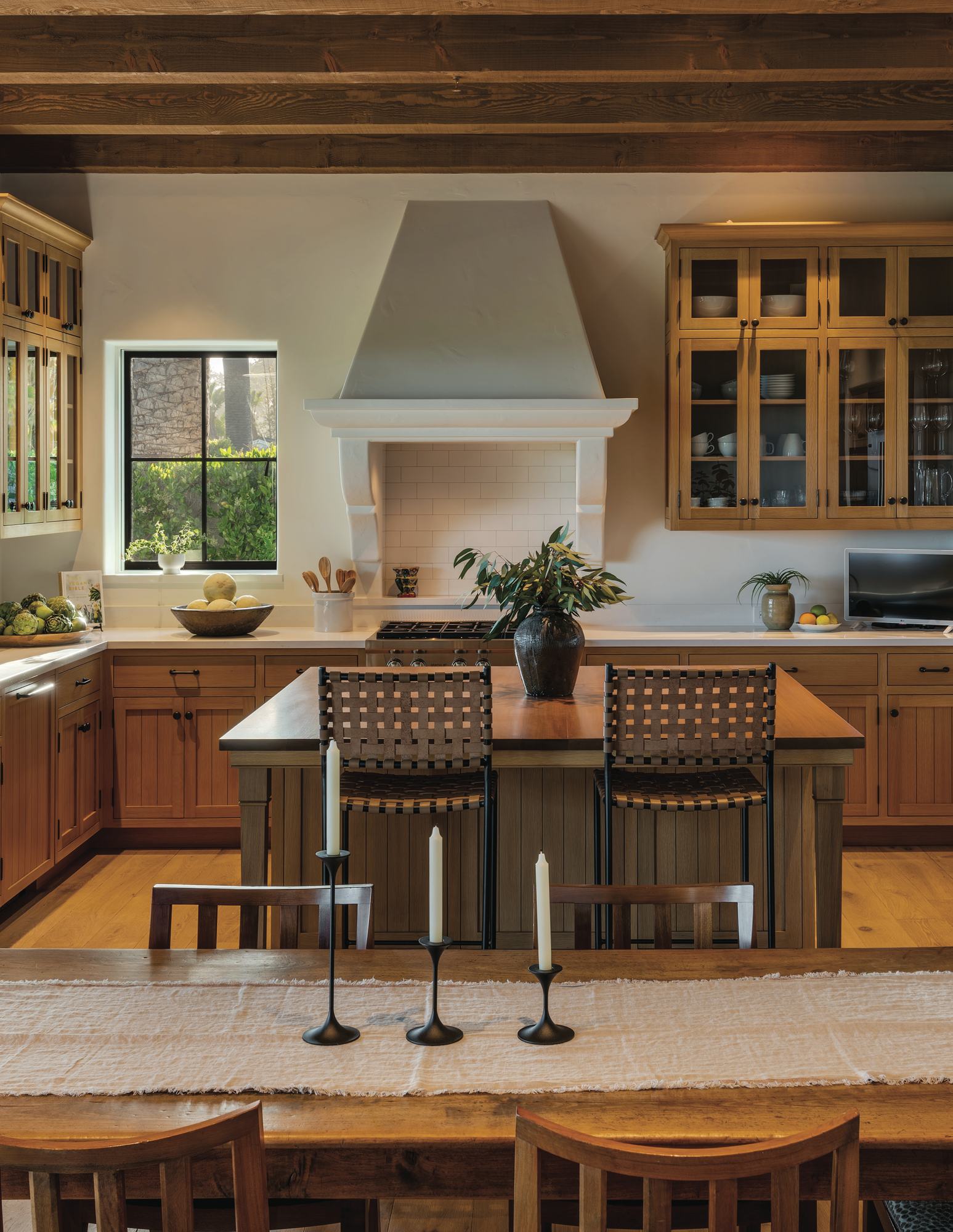 A kitchen with a stone island