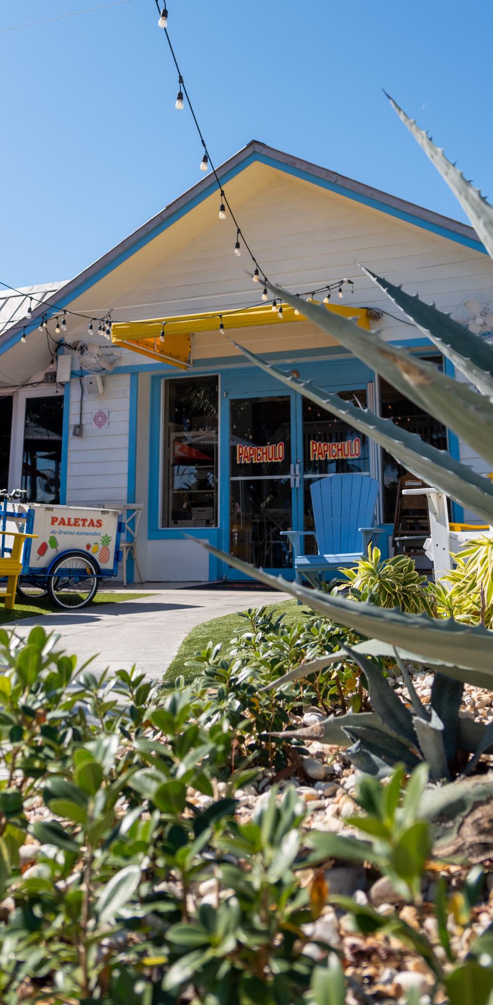 A blue cottage storefront, Tequesta